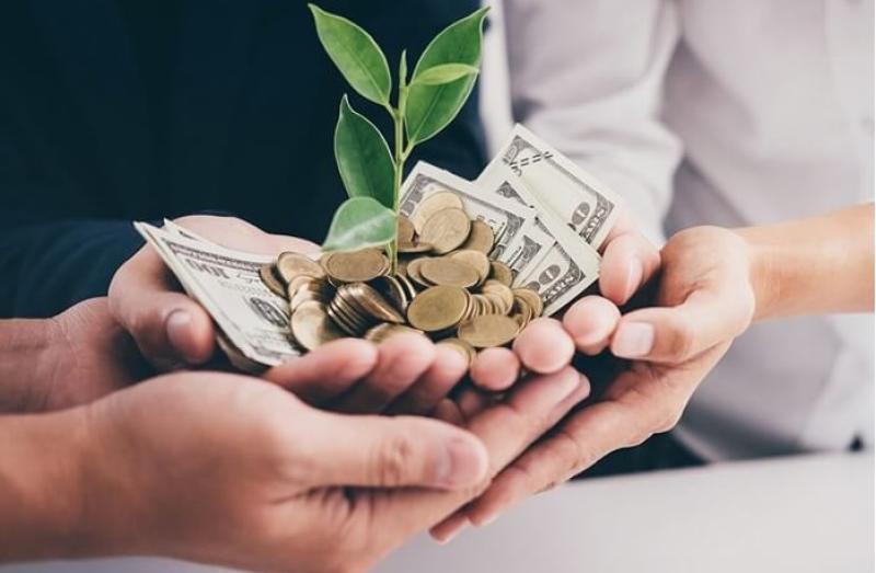 لدعم المشروعات الصناعية والزراعية والخدمية.. اعرف مزايا برنامج تمويل الأهلي بيزنس